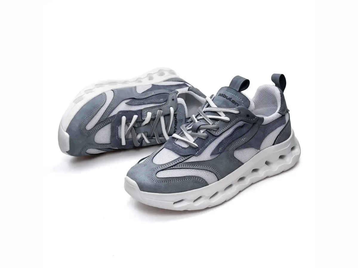 A pair of Babylon Pulse-13 trainers, side and back view