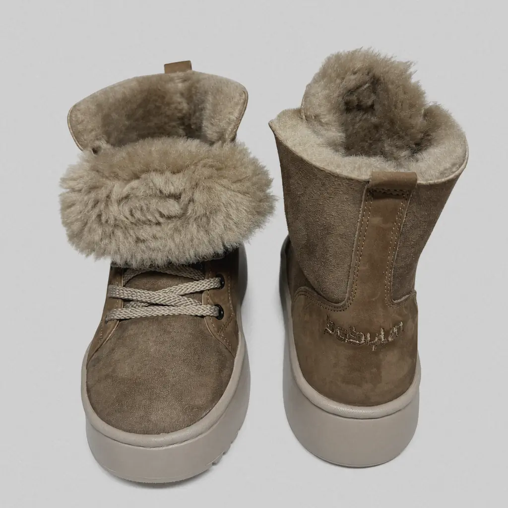 Brown Frost-94 sheepskin boots on a light platform: one with the fur cuff folded down, the other worn up, front and back views